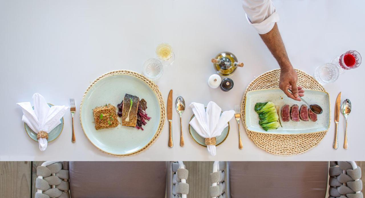 马拉希尼库达班多度假村 胡鲁马累 外观 照片 A place setting